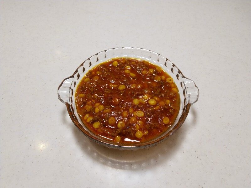 Tomato and garlic sauce with chana dal for ashak