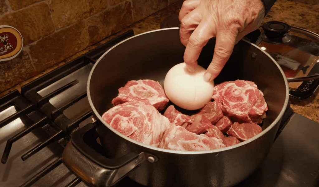 cooking red meat with onion